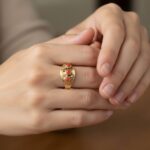 Christian goud ring met 3 bloedkoralen