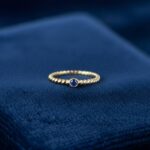 Tors gouden ring met saffier