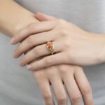 Christian goud ring met 1 bloedkoraal