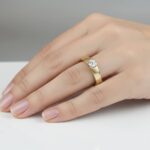 Gouden memoire ring met zirkonia