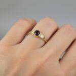 Christian goud ring met 1 granaat