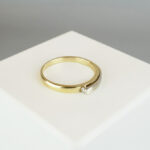 Gouden fantasie ring met 1 diamant