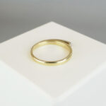 Gouden fantasie ring met 1 diamant