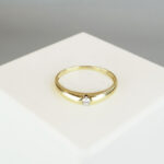 Gouden solitair ring met 0.04ct.