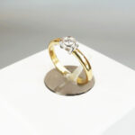 Wit en geel gouden ring met 0.14ct.