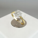 Gouden ring met ster zetting 0.22ct.
