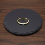 Gouden ring met 0.02ct. v zetting