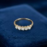 Bi color gouden ring met 5 diamanten