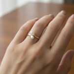 Gouden ring met dubbele parel