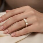 Gouden ring met 3 parels