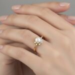 Gouden parel ring in bloem model