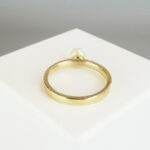 Gouden ring met solitair parel