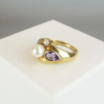 Gouden ring met amethist, diamant & parel