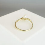Gouden ring met dubbele parel