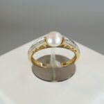 Gouden ring met parel en diamant