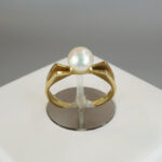 Gouden ring met 1 parel