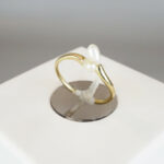 Gouden ring met dubbele parel