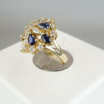 Gouden ring met diverse zirkonia