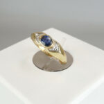 Gouden fantasie ring met saffier