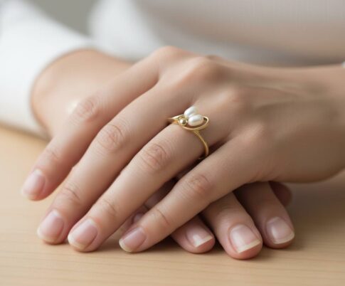 Geel gouden ring met dubbele parel