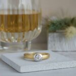 Bicolor gouden Christian ring zirkonia