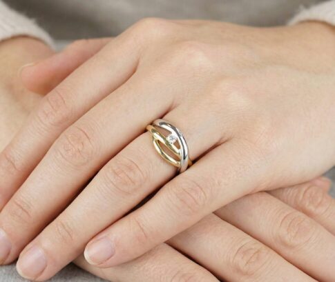 Christian bicolor gouden ring met 0.10ct.