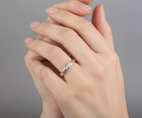 Christian gouden bicolor ring met 3 diamanten