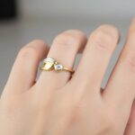 Bicolor gouden Christian ring met 0.05ct.