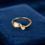 Bicolor gouden Christian ring met 0.05ct.