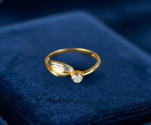 Bicolor gouden Christian ring met 0.05ct.