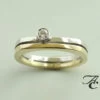 Wit- en geel gouden ring met solitair briljant geslepen diamant