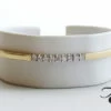 Geel gouden slavenarmband met briljanten