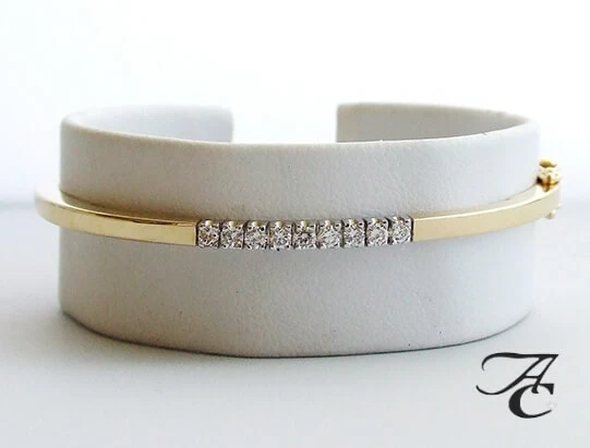 Geel gouden slavenarmband met briljanten