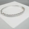 Wit gouden slavenarmband met zirkonia