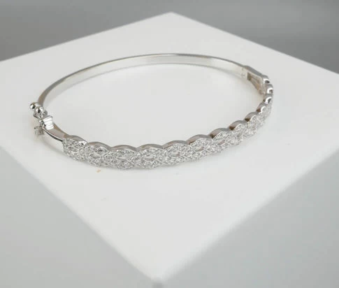 Wit gouden slavenarmband met zirkonia