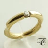 Gouden fantasie ring met briljant