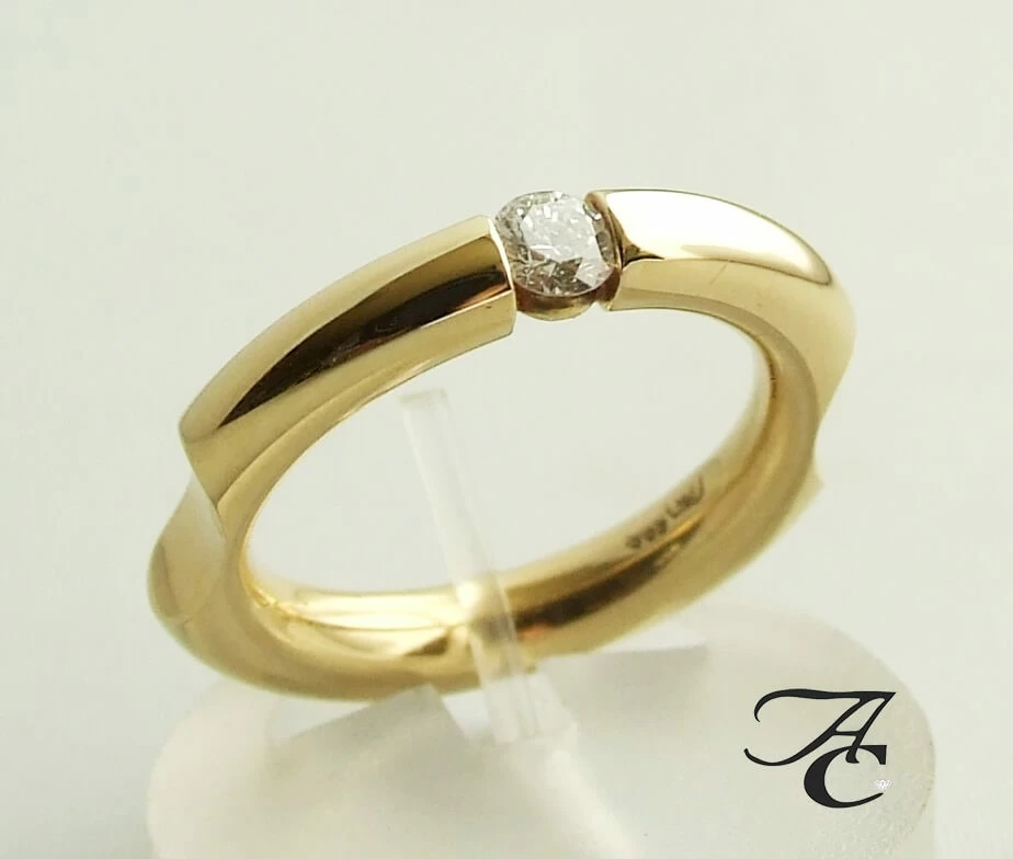 Gouden fantasie ring met briljant