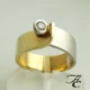 Bicolor ring met briljant