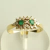 Gouden ring met smaragd en diamant