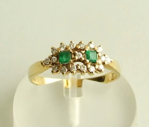 Gouden ring met smaragd en diamant