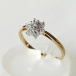 Gouden entourage ring met briljant