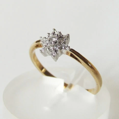 Gouden entourage ring met briljant