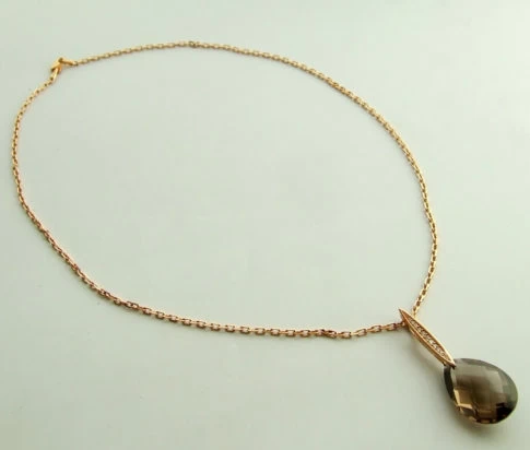 Gouden collier met rookkwarts en diamant