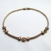 Gouden collier met saffier