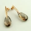 Gouden oorbellen met rookkwarts en diamant