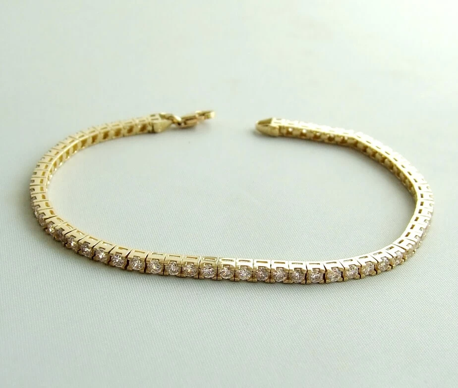 Christian gouden armband met zirkonia