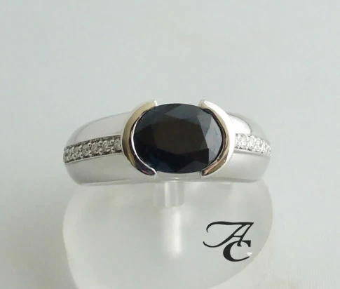 Wit gouden ring met briljanten en saffier