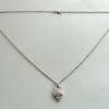 Gouden collier en art-deco hanger met briljant