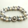 Parel armband met gouden slot met diamant