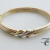 Gouden tricolor armband met diamant